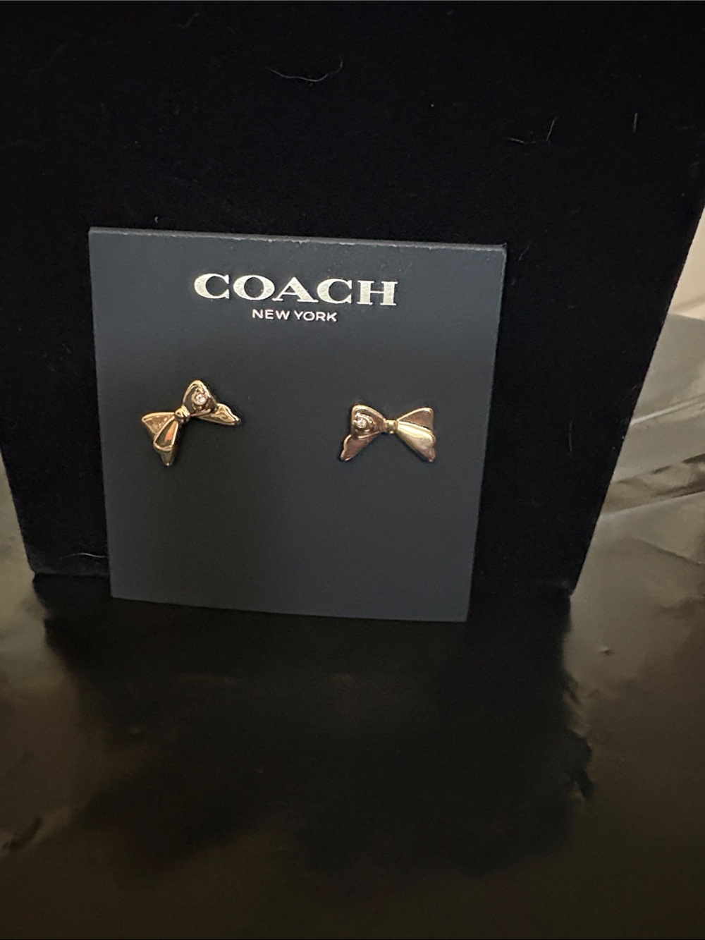 COACH Gold Bow Stud Earrings